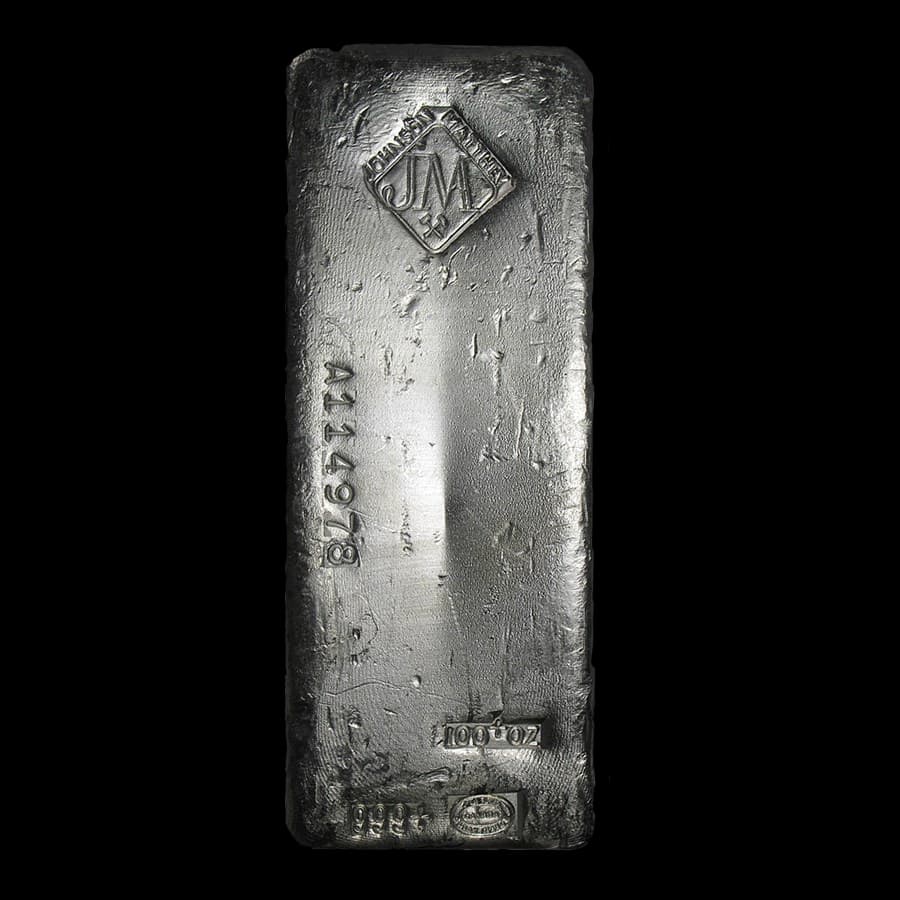 100 oz Johnson Matthey poured silver bar showing the JM diamond hallmark, serial number A114978, 100 oz and 999+ stamps