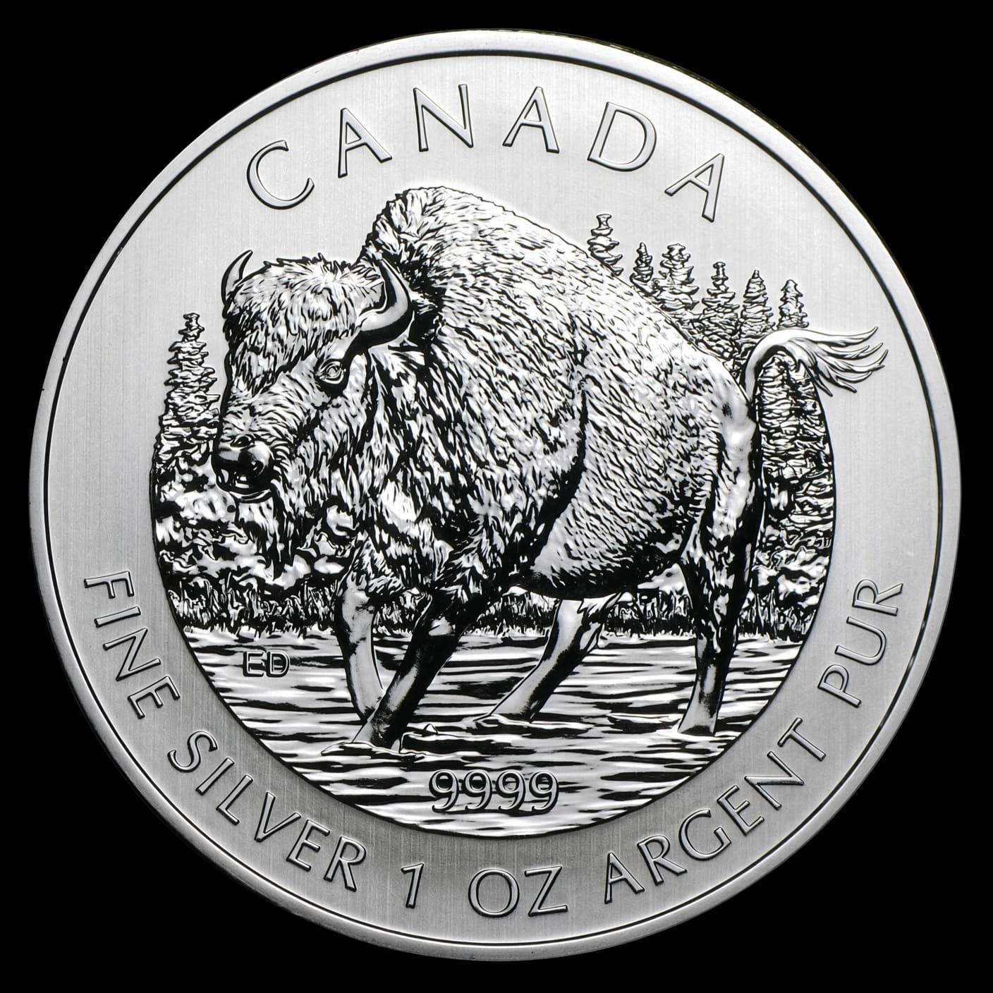 2013 Canada 1 oz silver Wildlife Series Wood Bison coin reverse showing a bison crossing water before a treeline